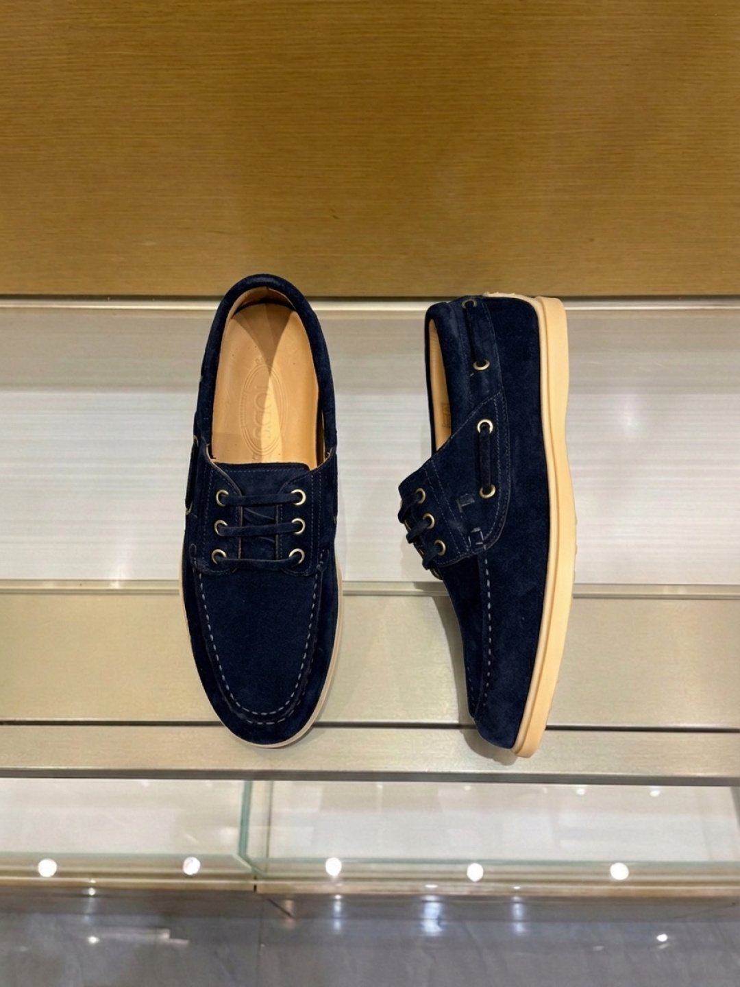 Tod's Navy Blue Boat Shoes — front