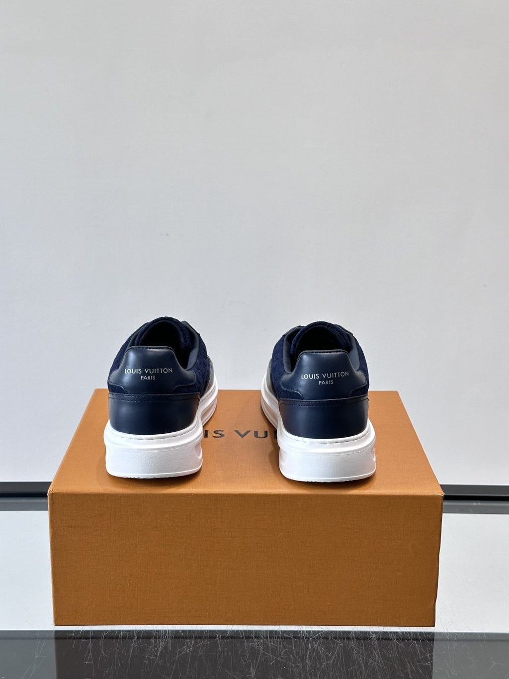 Louis Vuitton Embossed Low-Top Sneakers — back
