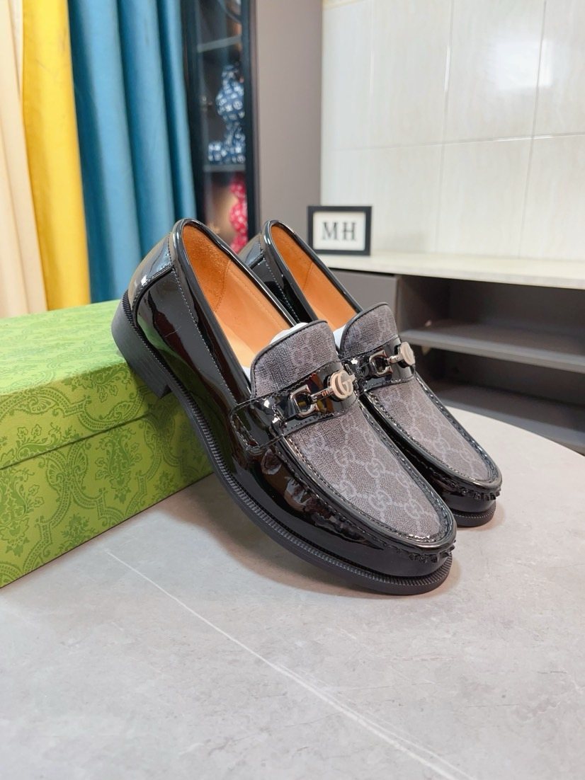 Gucci Embossed Metal-Hardware Loafers — front